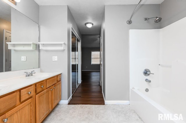 2331 W Molly Ln, Dunlap, IL 61525 - full bath with  shower combination, double vanity, tile patterned floors, and baseboards