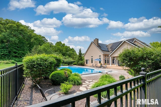 1112 W Cedar Hills Dr, Dunlap, IL 61525 - view of swimming pool with a patio