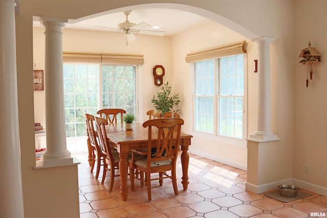1112 W Cedar Hills Dr, Dunlap, IL 61525 - dining room featuring ceiling fan, baseboards, arched walkways, and recessed lighting