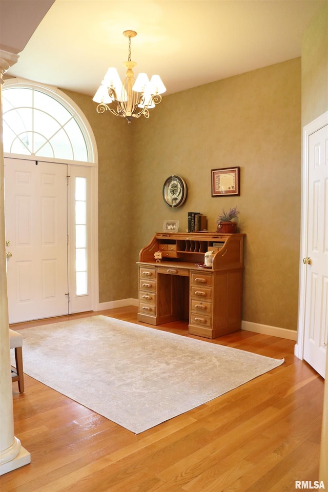 1112 W Cedar Hills Dr, Dunlap, IL 61525 - office featuring a chandelier, light wood-style flooring, baseboards, and decorative columns