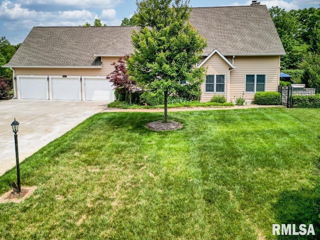 1112 W Cedar Hills Dr, Dunlap, IL 61525 - view of front facade with driveway, a chimney, a shingled roof, and a garage