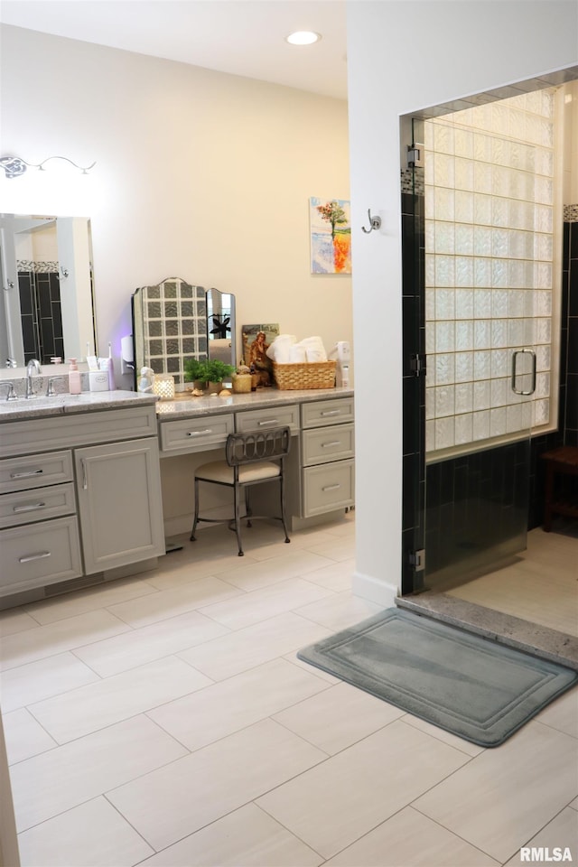 1112 W Cedar Hills Dr, Dunlap, IL 61525 - bathroom with vanity, a shower stall, tile patterned floors, and recessed lighting