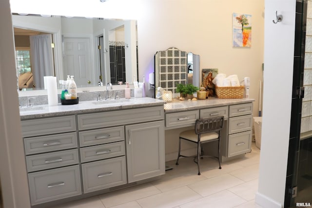 1112 W Cedar Hills Dr, Dunlap, IL 61525 - full bathroom featuring double vanity and tile patterned floors