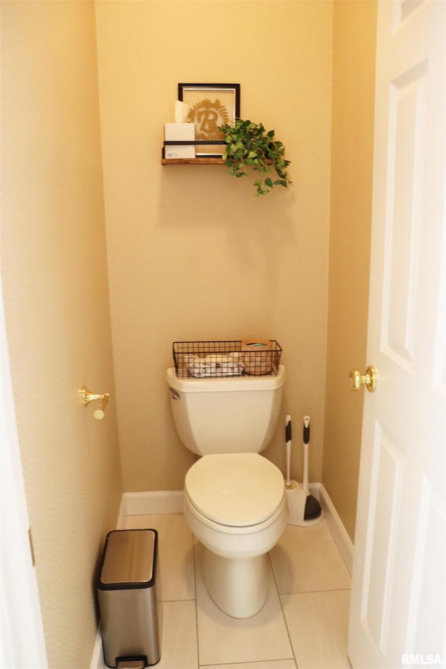 1112 W Cedar Hills Dr, Dunlap, IL 61525 - bathroom with toilet, baseboards, and tile patterned flooring