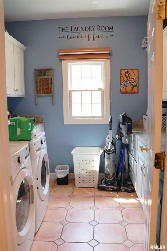 1112 W Cedar Hills Dr, Dunlap, IL 61525 - washroom featuring cabinet space, independent washer and dryer, and light tile patterned floors