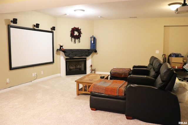 1112 W Cedar Hills Dr, Dunlap, IL 61525 - carpeted cinema room featuring a fireplace and baseboards