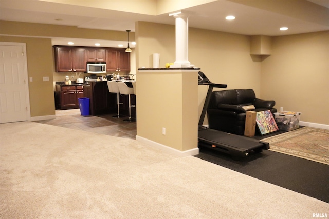 1112 W Cedar Hills Dr, Dunlap, IL 61525 - living room featuring recessed lighting, light colored carpet, baseboards, and decorative columns