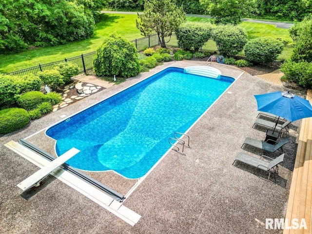 1112 W Cedar Hills Dr, Dunlap, IL 61525 - view of swimming pool with a fenced backyard, a diving board, a patio, and view of wooded area