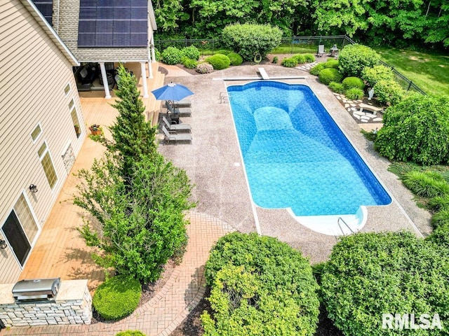 1112 W Cedar Hills Dr, Dunlap, IL 61525 - view of swimming pool featuring a fenced backyard, a patio, and a diving board
