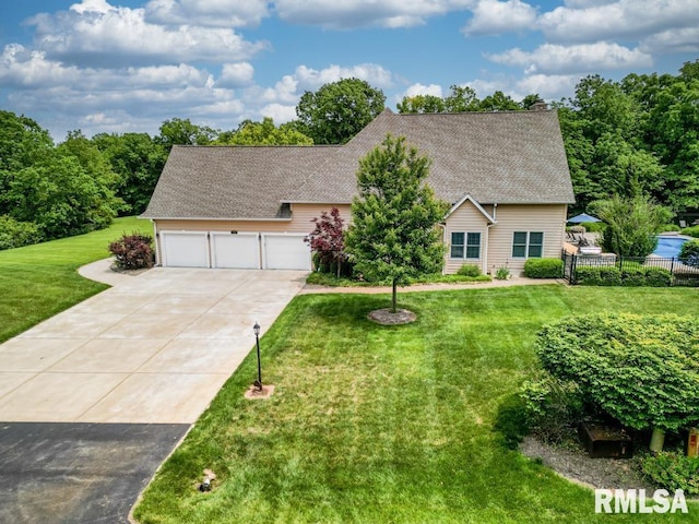 1112 W Cedar Hills Dr, Dunlap, IL 61525 - view of front of property featuring driveway and roof with shingles