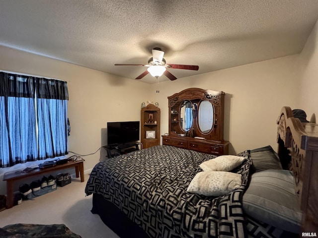 1612 Joyce Ln, Macomb, IL 61455 - bedroom with carpet, a ceiling fan, and a textured ceiling