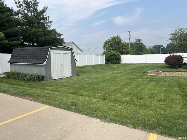 1302 Maple Ave, Macomb, IL 61455 - view of yard featuring a fire pit