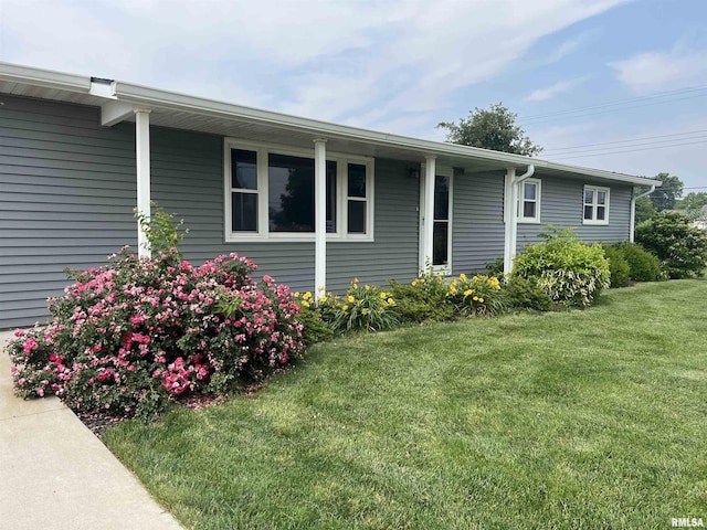 1302 Maple Ave, Macomb, IL 61455 - view of side of property featuring a lawn