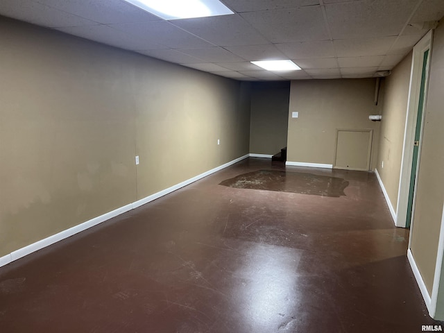 1302 Maple Ave, Macomb, IL 61455 - finished below grade area featuring a drop ceiling and baseboards
