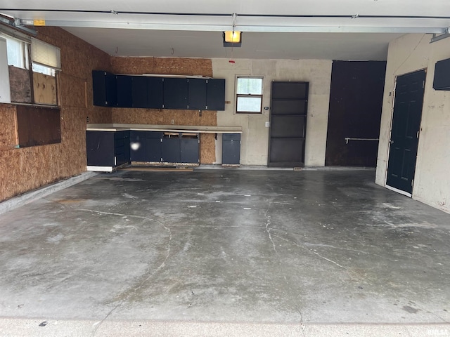 1302 Maple Ave, Macomb, IL 61455 - garage featuring a garage door opener