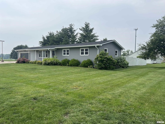 1302 Maple Ave, Macomb, IL 61455 - ranch-style house with an attached garage