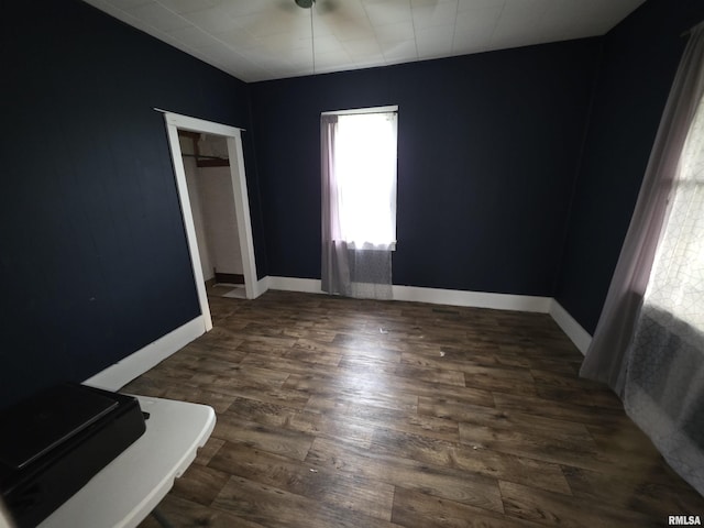 504 S Pennsylvania Ave, Abingdon, IL 61510 - unfurnished room with dark wood-type flooring and baseboards
