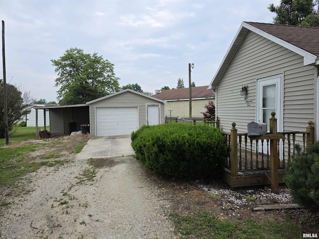 504 S Pennsylvania Ave, Abingdon, IL 61510 - view of home's exterior with a garage, an outbuilding, and driveway