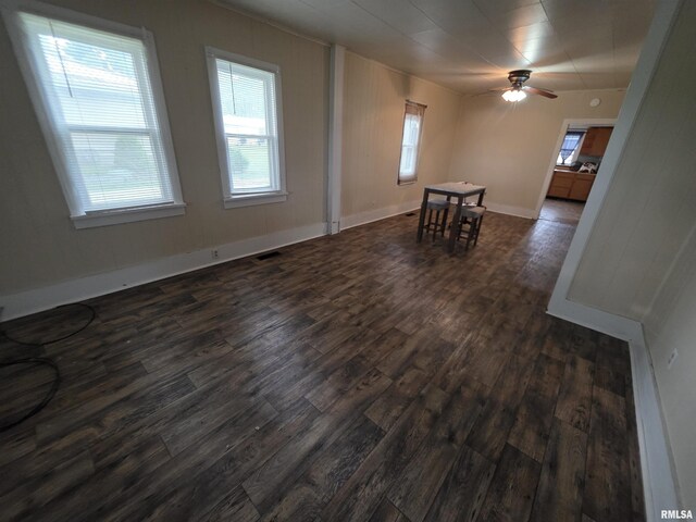 504 S Pennsylvania Ave, Abingdon, IL 61510 - spare room featuring dark wood-style flooring and ceiling fan