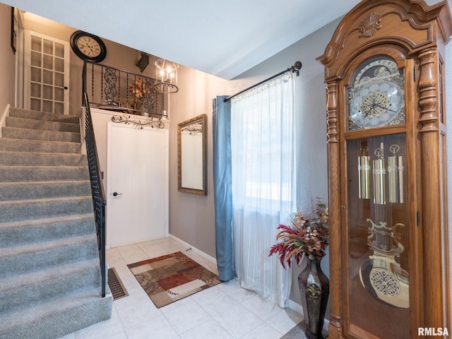 2010 E Paris Ave, Peoria, IL 61614 - foyer with stairs and a chandelier