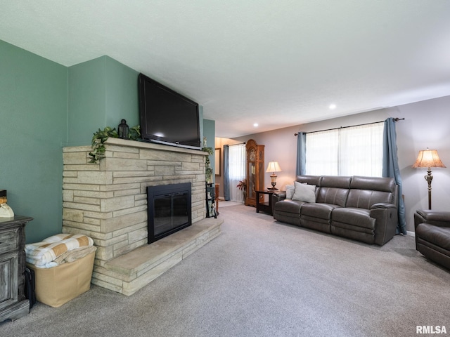 2010 E Paris Ave, Peoria, IL 61614 - living room with a fireplace, carpet, and recessed lighting