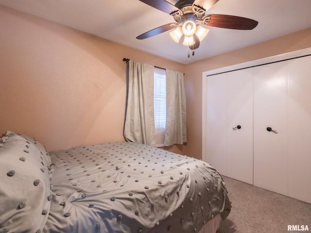 2010 E Paris Ave, Peoria, IL 61614 - carpeted bedroom featuring a closet and a ceiling fan