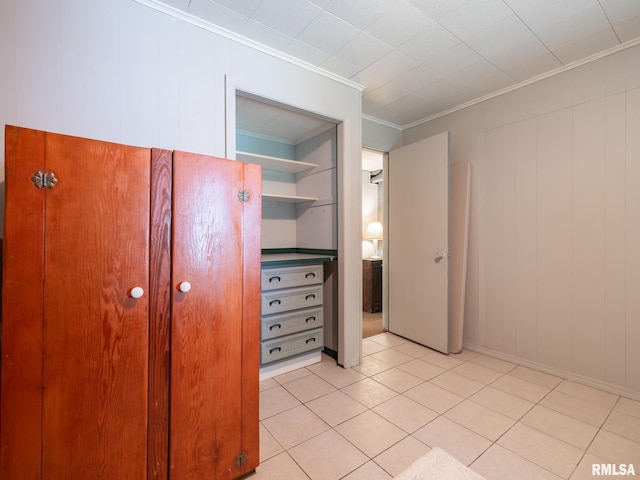 2010 E Paris Ave, Peoria, IL 61614 - unfurnished bedroom with ornamental molding and light tile patterned floors