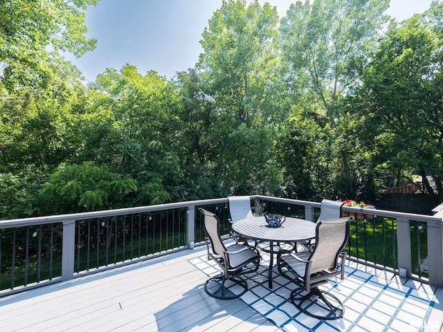 2010 E Paris Ave, Peoria, IL 61614 - wooden terrace with outdoor dining area