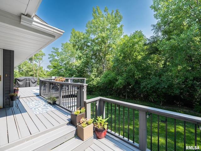 2010 E Paris Ave, Peoria, IL 61614 - deck featuring a lawn