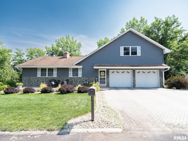 2010 E Paris Ave, Peoria, IL 61614 - traditional-style house with stone siding, a chimney, and a front lawn