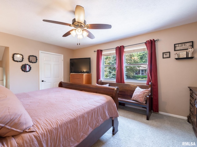 2010 E Paris Ave, Peoria, IL 61614 - bedroom with light colored carpet and a ceiling fan