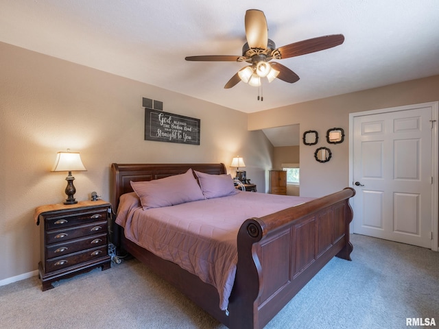 2010 E Paris Ave, Peoria, IL 61614 - carpeted bedroom featuring ceiling fan and baseboards