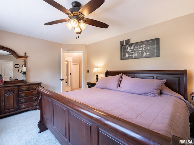 2010 E Paris Ave, Peoria, IL 61614 - bedroom with light carpet and ceiling fan