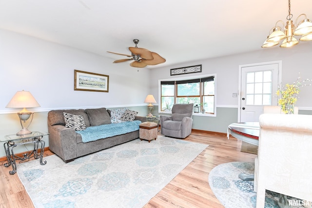 4126 N Chelsea Pl, Peoria, IL 61614 - living area featuring a chandelier, wood finished floors, and ceiling fan