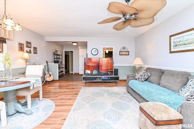 4126 N Chelsea Pl, Peoria, IL 61614 - living area with wood finished floors and ceiling fan