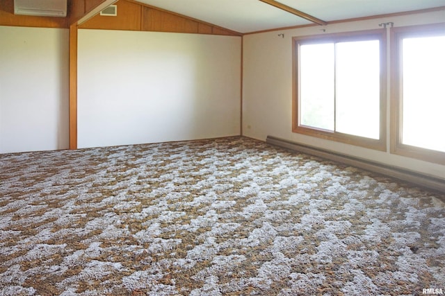 18223 N Slane Rd, Princeville, IL 61559 - unfurnished room with a wall mounted AC, lofted ceiling, a baseboard heating unit, and carpet