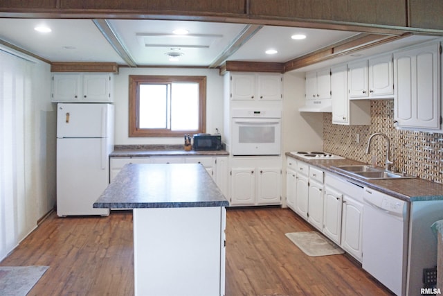 18223 N Slane Rd, Princeville, IL 61559 - kitchen with white appliances, tasteful backsplash, white cabinets, dark countertops, and recessed lighting