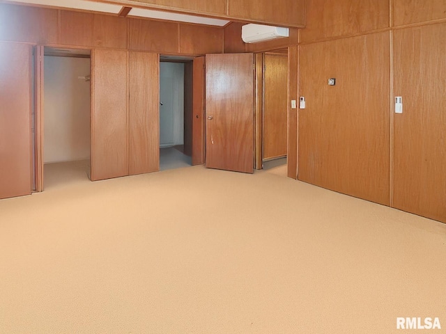 18223 N Slane Rd, Princeville, IL 61559 - unfurnished bedroom featuring a wall mounted air conditioner and carpet floors