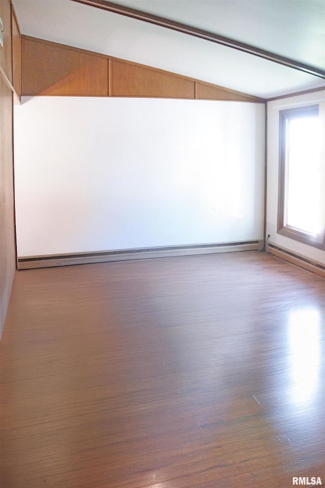 18223 N Slane Rd, Princeville, IL 61559 - unfurnished room with wood finished floors and lofted ceiling