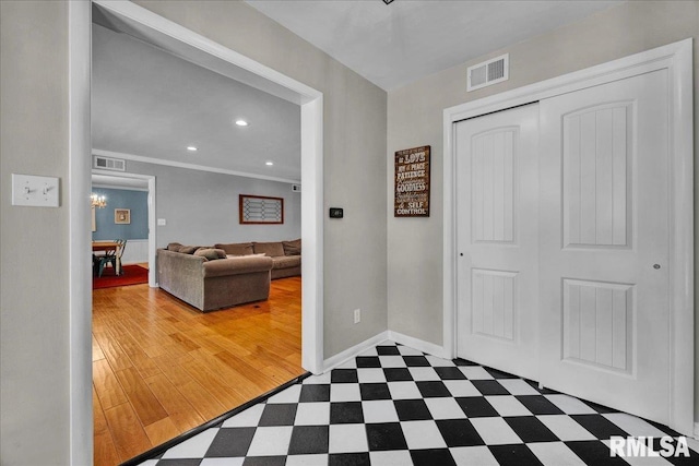 486 E High Point Dr, Peoria, IL 61614 - foyer entrance featuring baseboards, tile patterned floors, ornamental molding, and recessed lighting