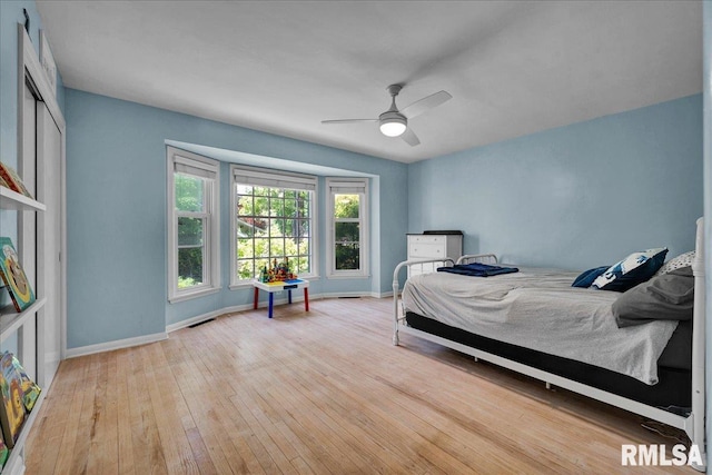486 E High Point Dr, Peoria, IL 61614 - bedroom with hardwood / wood-style flooring, baseboards, and ceiling fan