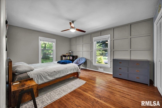 486 E High Point Dr, Peoria, IL 61614 - bedroom with wood finished floors and ceiling fan