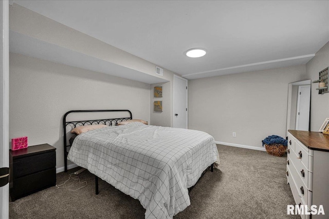 486 E High Point Dr, Peoria, IL 61614 - bedroom featuring dark colored carpet and baseboards