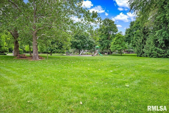 486 E High Point Dr, Peoria, IL 61614 - view of green lawn featuring a playground