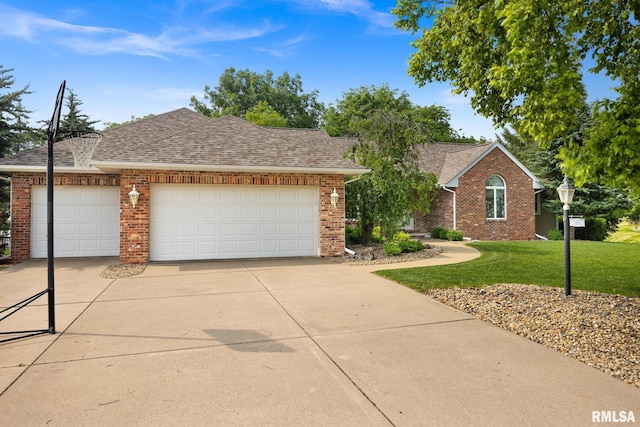 905 Highland Ct, Germantown Hills, IL 61548 - view of front facade featuring brick siding, a front yard, driveway, a garage, and a shingled roof