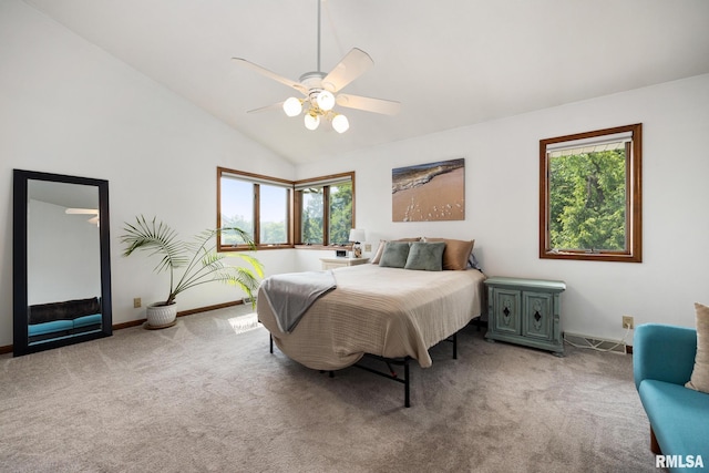 905 Highland Ct, Germantown Hills, IL 61548 - carpeted bedroom featuring multiple windows, baseboards, ceiling fan, and high vaulted ceiling