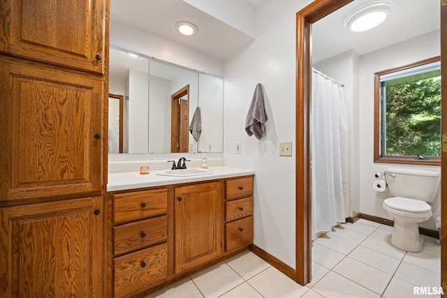 905 Highland Ct, Germantown Hills, IL 61548 - bathroom with vanity, toilet, tile patterned flooring, and baseboards