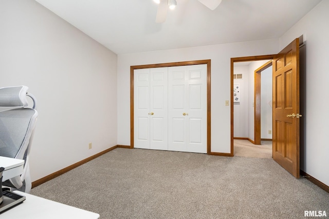 905 Highland Ct, Germantown Hills, IL 61548 - unfurnished bedroom with light colored carpet, baseboards, a closet, and ceiling fan