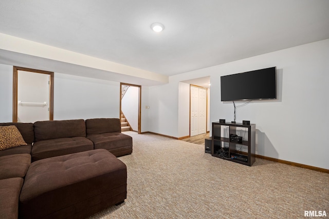 905 Highland Ct, Germantown Hills, IL 61548 - living room with light carpet, baseboards, and stairs