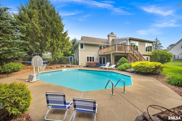 905 Highland Ct, Germantown Hills, IL 61548 - view of swimming pool with stairway, a deck, a patio area, and a hot tub